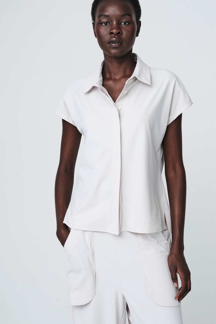 Wilma structure tech jersey blouse